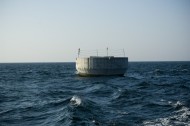 Offshore anchored concrete foundation